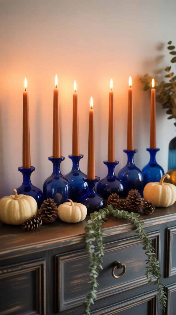 Orange Candles in Blue Glass Holders